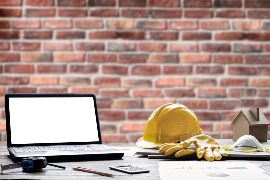 construction worker with laptop